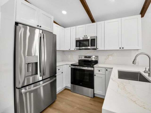 Продажа дома по адресу 10151 Windtree Lane N - фото 6850222