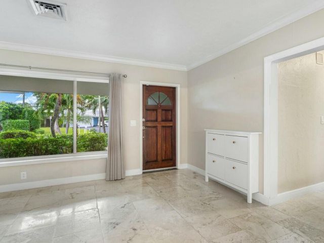 Дом в аренду по адресу 121 NE Spanish Court - фото 6851157