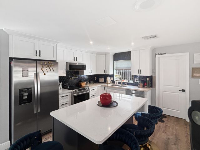 Дом в аренду по адресу 100 SW 17th Street - фото 6865238