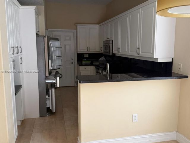 Дом в аренду по адресу 3085 NE 208th Ter - фото 6886271