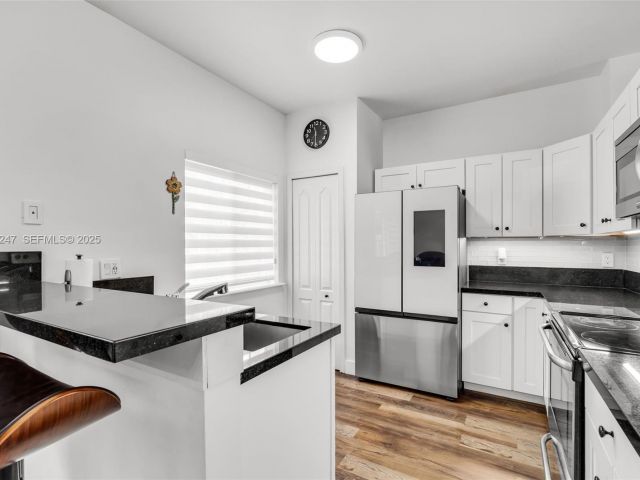 Продажа дома по адресу 12661 SW 143rd Ln 12661 - фото 7522599