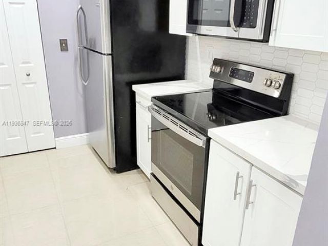 Дом в аренду по адресу 1005 NE 42nd Pl - фото 7433361