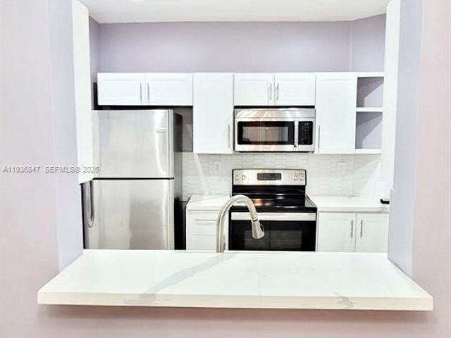 Дом в аренду по адресу 1005 NE 42nd Pl - фото 7433362