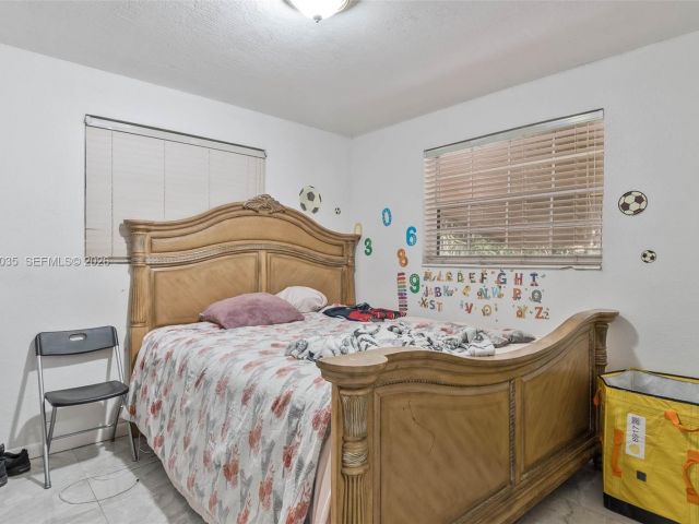 Продажа дома по адресу 827 NW 73rd St - фото 7532668