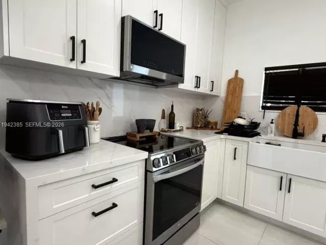 Продажа дома по адресу 1220 NW 125th St - фото 7025909