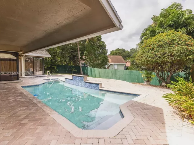 Дом в аренду по адресу 8775 SW 57th St - фото 7128371