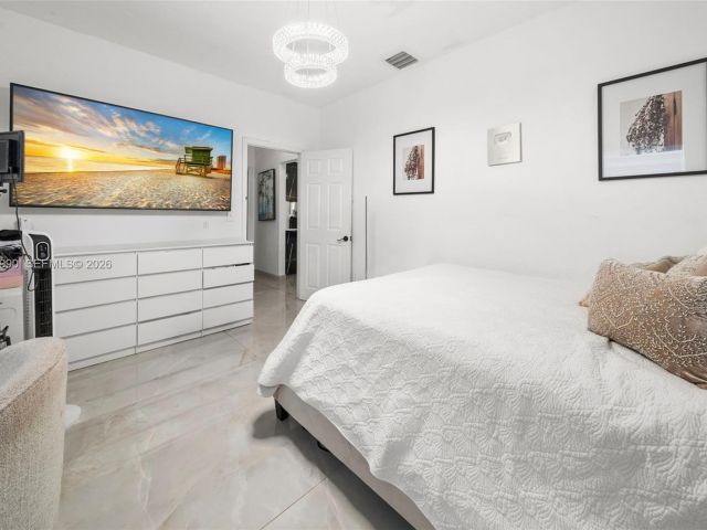 Продажа дома по адресу 8918 Harding Ave - фото 7098623