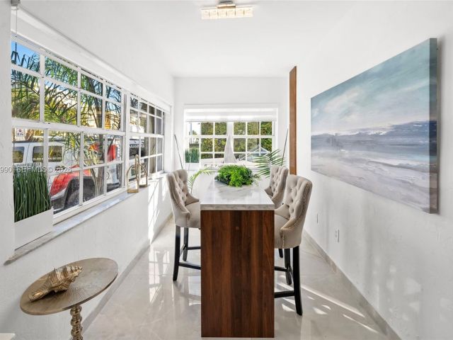 Продажа дома по адресу 8918 Harding Ave - фото 7098629