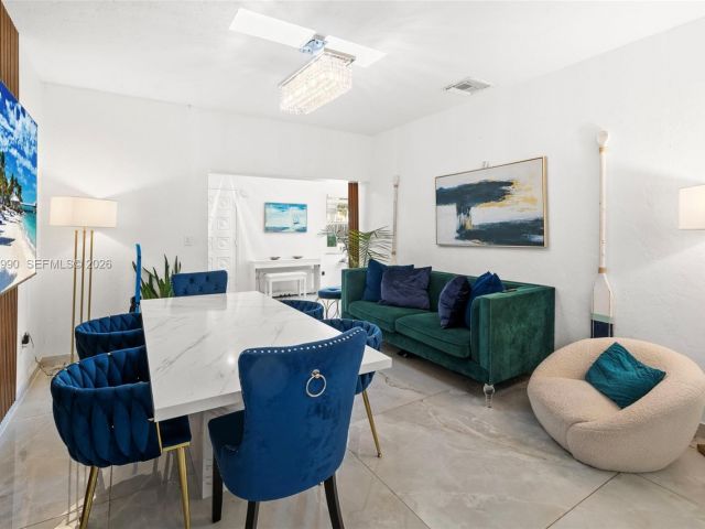 Продажа дома по адресу 8918 Harding Ave - фото 7098632