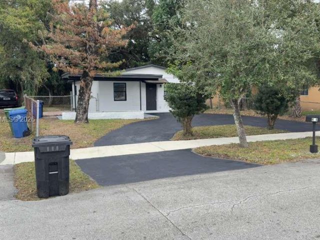 Дом в аренду по адресу 404 NW 21st Ter - фото 7496878