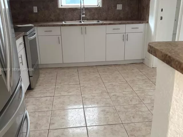 Дом в аренду по адресу 280 NE 48th Ter - фото 7269569