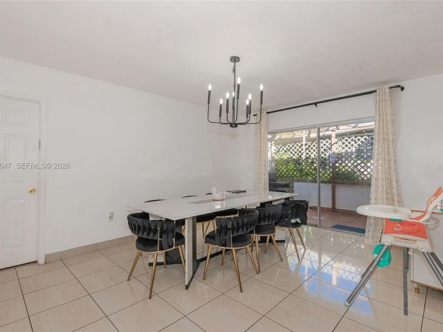 Продажа дома по адресу 8950 Harding Ave - фото 7288005