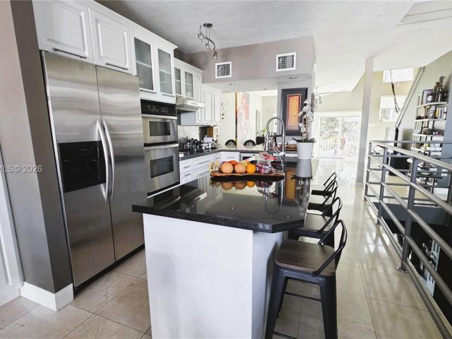 Продажа дома по адресу 10240 SW 154th Cir Ct 103-6 - фото 7439706