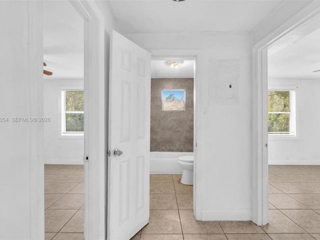 Дом в аренду по адресу 2800 NW 6th Ct - фото 7445148