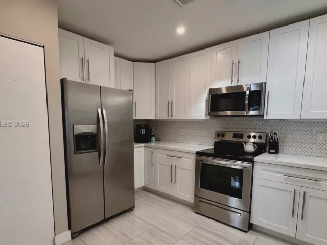 Продажа дома по адресу 1324 NE 14th Ave - фото 7410369