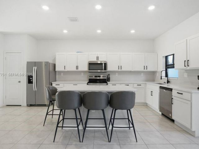 Дом в аренду по адресу 816 NW 3rd Ter 818 - фото 7478172