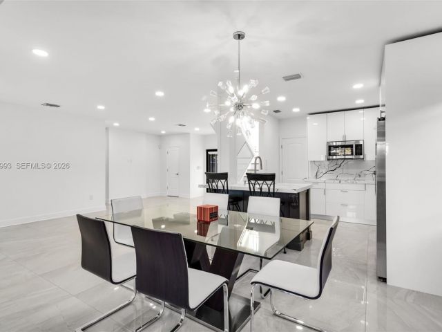 Продажа дома по адресу 66 NW 73rd Place - фото 7514906