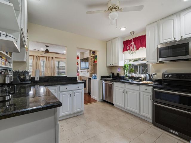 Продажа дома по адресу 10308 Greenbriar Ct - фото 7453477