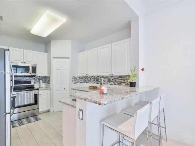 Продажа дома по адресу 11227 NW 73rd Ter - фото 7486253