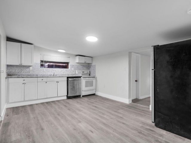 Дом в аренду по адресу 914 NW 80th St 1 - фото 7507661