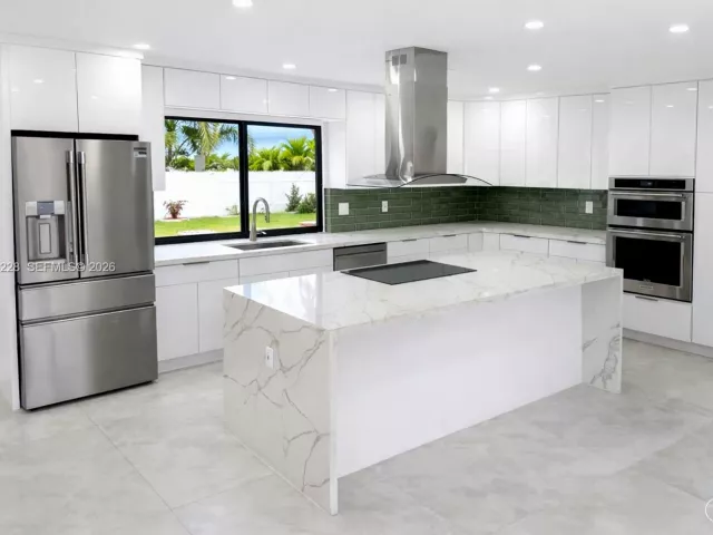 Продажа дома по адресу 6020 NE 18th Ter - фото 7405628