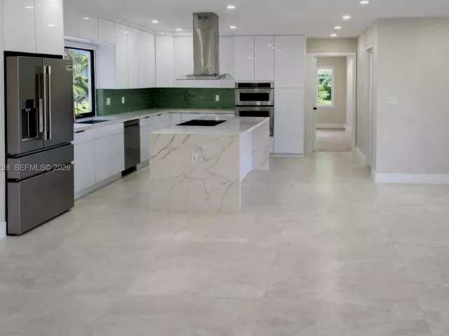 Продажа дома по адресу 6020 NE 18th Ter - фото 7405629