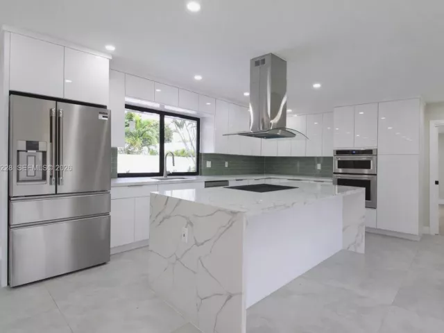 Продажа дома по адресу 6020 NE 18th Ter - фото 7405624