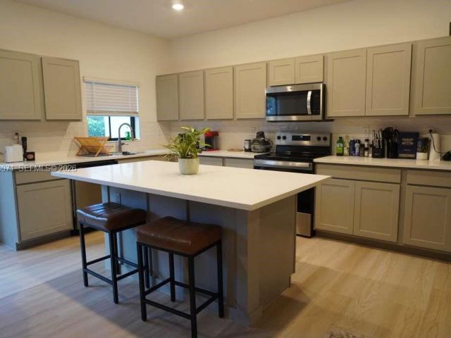 Дом в аренду по адресу 385 NW 9th St 385 - фото 7420805