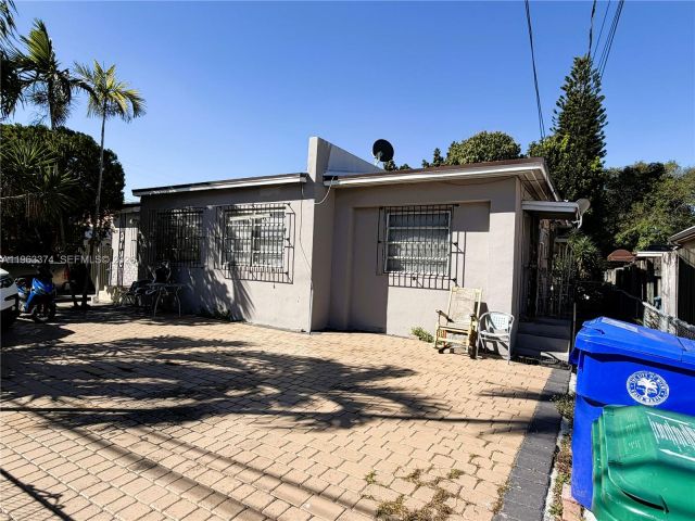 Продажа дома по адресу 430 NW 53rd Ave - фото 7433852