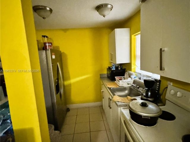 Продажа дома по адресу 430 NW 53rd Ave - фото 7433860