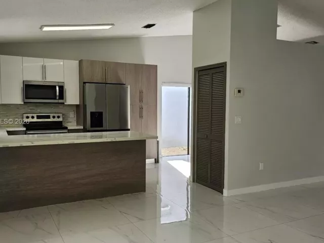 Дом в аренду по адресу 14470 SW 96th Ter - фото 7414075