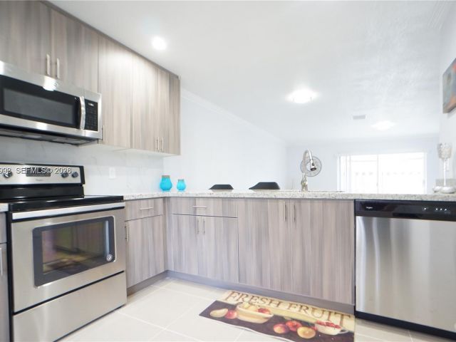 Дом в аренду по адресу 610 NW 108th Ter . - фото 7430617