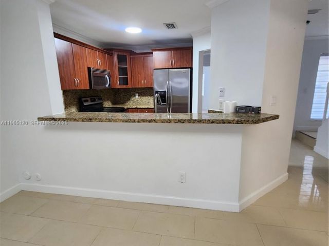 Продажа дома по адресу 6485 SW 129th Ave - фото 7445506