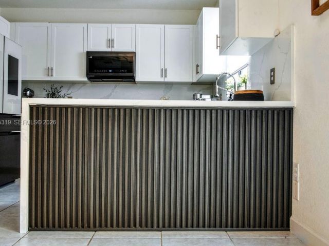 Продажа дома по адресу 20917 NE 8th Ave - фото 7444039