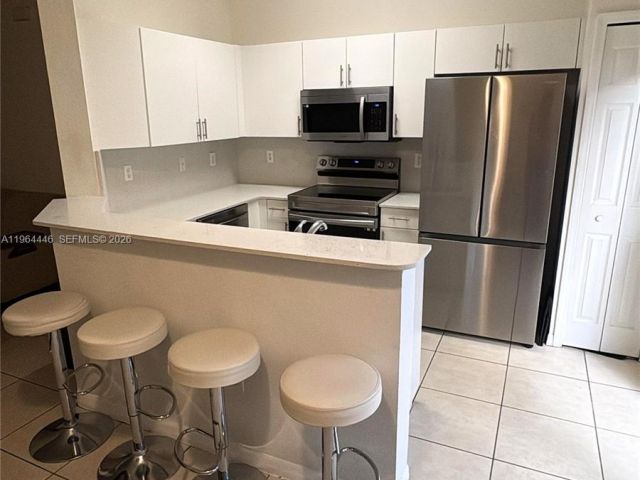 Дом в аренду по адресу 10776 NW 84th Ln 8-30 - фото 7485486