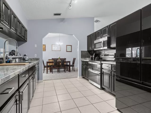 Продажа дома по адресу 12860 Sunset Blvd - фото 7451148