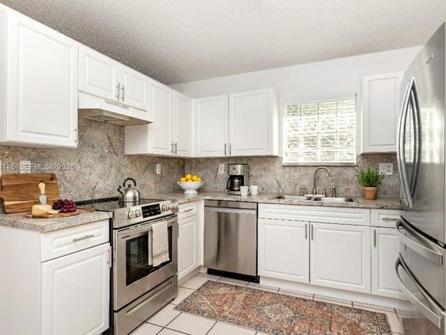 Продажа дома по адресу 14144 SW 149th Pl - фото 7438114