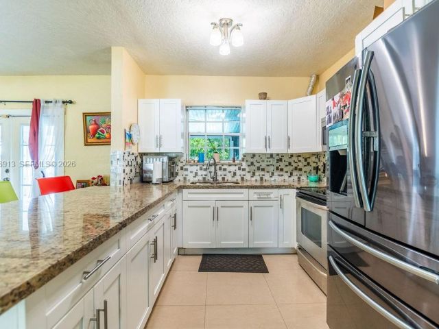 Продажа дома по адресу 6101 Flagler St - фото 7439964