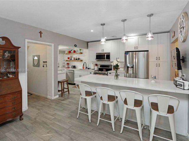 Продажа дома по адресу 1221 SW 74th Ct - фото 7441522