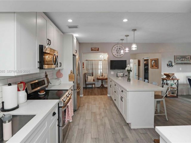 Продажа дома по адресу 1221 SW 74th Ct - фото 7441524