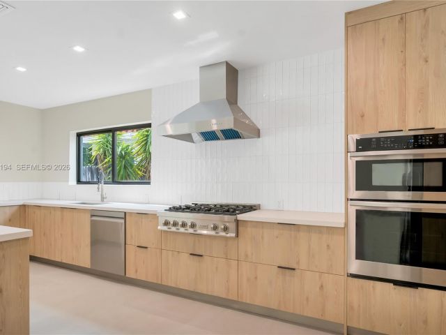 Дом в аренду по адресу 910 W 47th Ct - фото 7525443