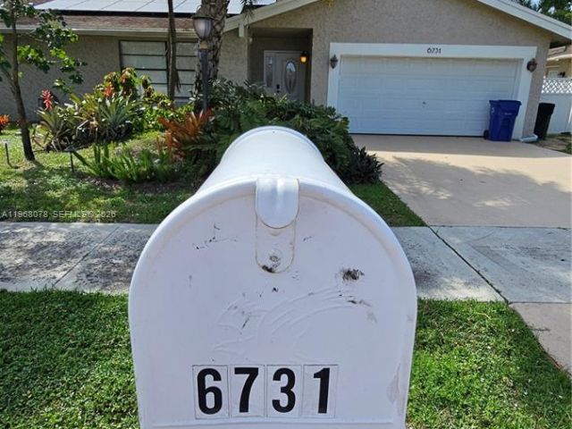 Дом в аренду по адресу 6731 NW 26th Way - фото 7481940