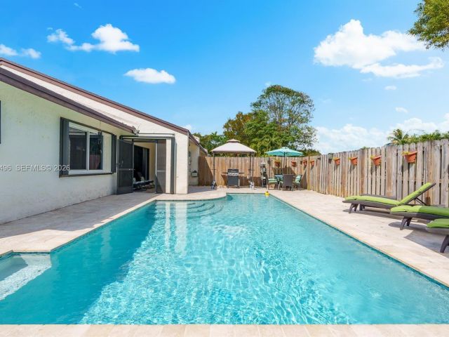 Продажа дома по адресу 2900 NW 69th Ct - фото 7483573