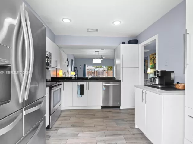 Продажа дома по адресу 2900 NW 69th Ct - фото 7483565