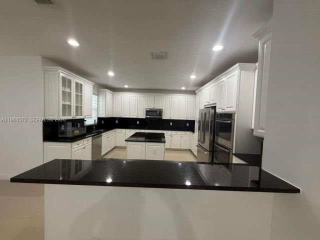 Продажа дома по адресу 9947 NW 86th Ter - фото 7486368