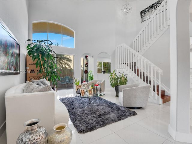 Дом в аренду по адресу 11261 NW 55th Ln - фото 7517139