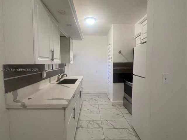 Дом в аренду по адресу 121 NE 169th Ter - фото 7481313