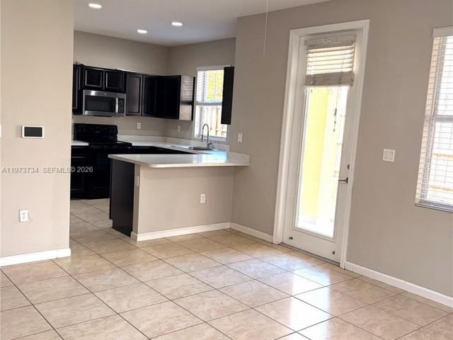 Дом в аренду по адресу 11471 SW 244th Ter NA - фото 7457380