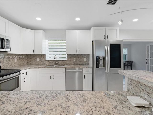 Продажа дома по адресу 309 SE 3rd Ter - фото 7529236