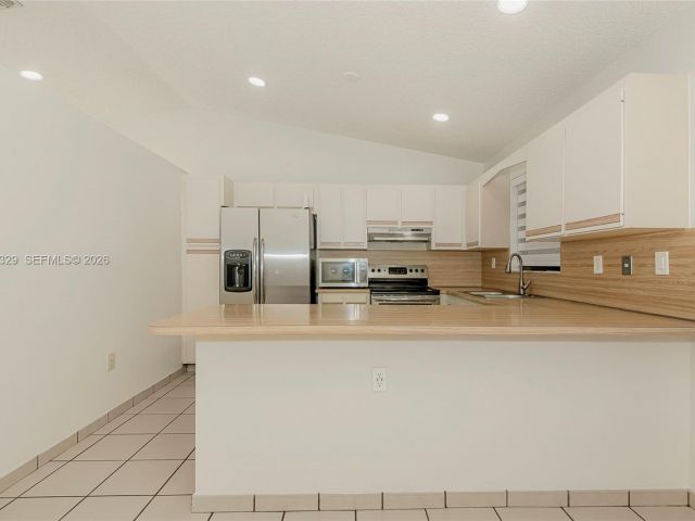 Продажа дома по адресу 5790 SW 148th Pl - фото 7517422